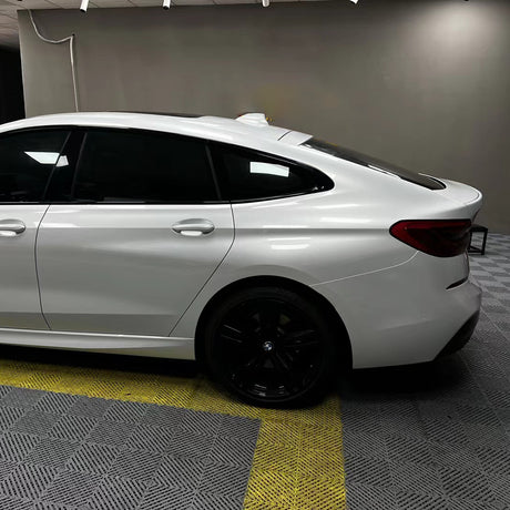 bmw wrapped in gloss crescent white car wrap