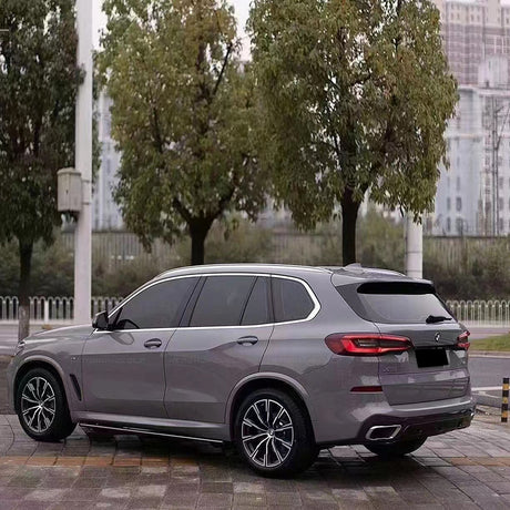 vehicle wrapped in gloss dark nado gray car wrap