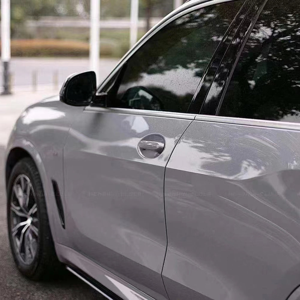 close up of gloss dark nado gray car wrap