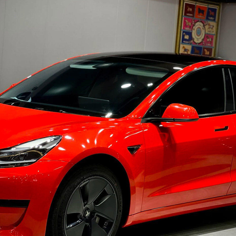 gloss ferrari red car wrap on a vehicle