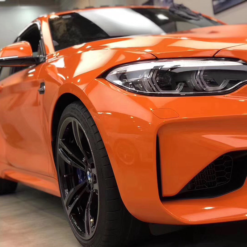 bmw wrapped in gloss flame orange car wrap