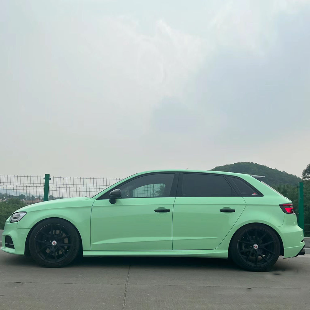 side profile of gloss hazy green car wrap