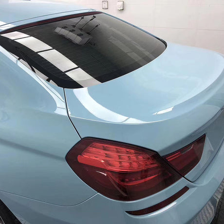 car wrapped in gloss ice blue car wrap