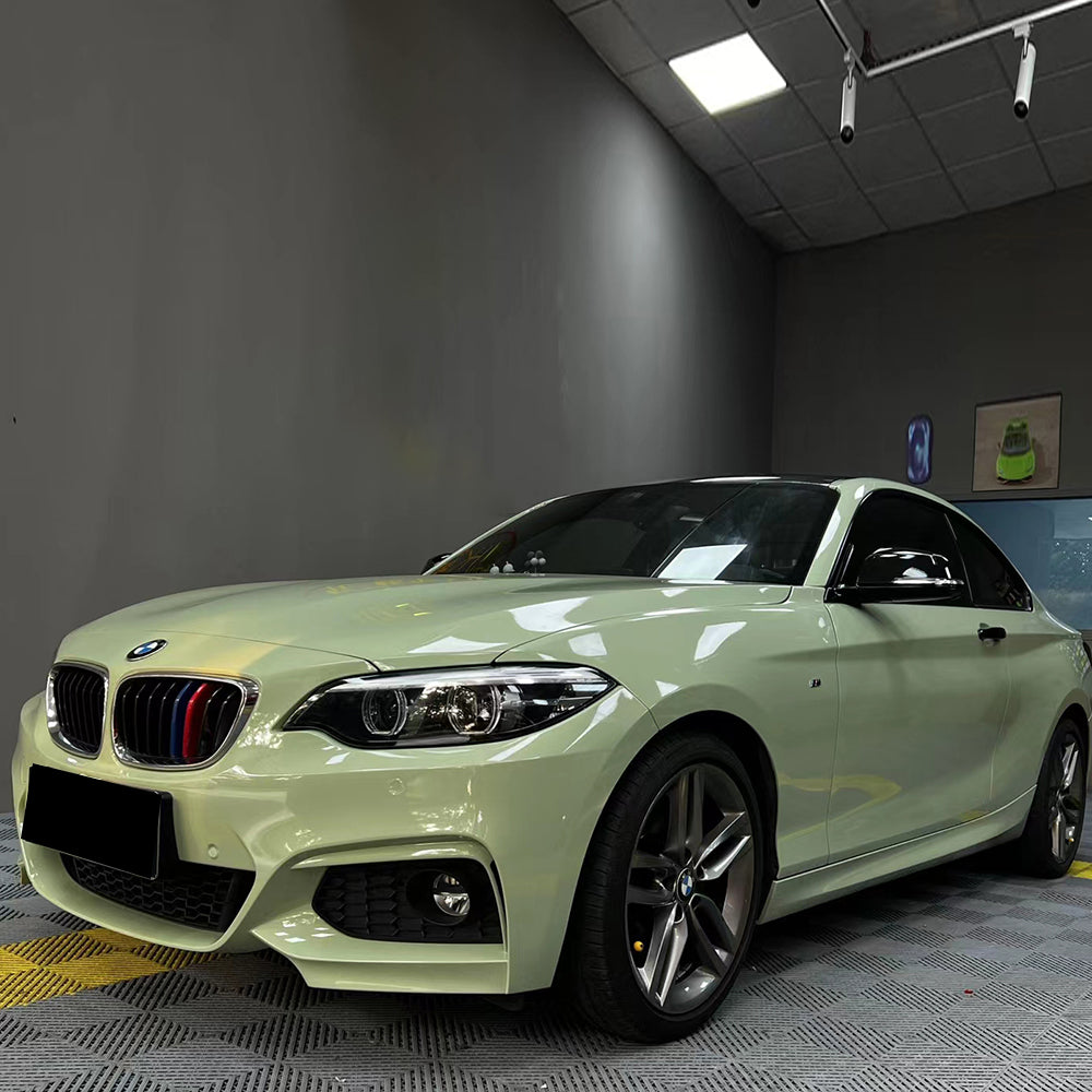 gloss khaki grey car wrap installed on a sports car