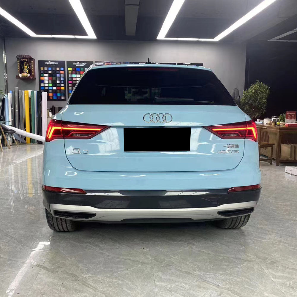 car wrapped in gloss light blue car wrap