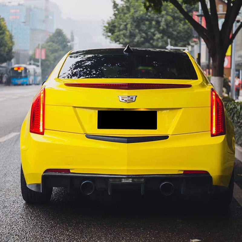 gloss maize yellow car wrap installed on a vehicle