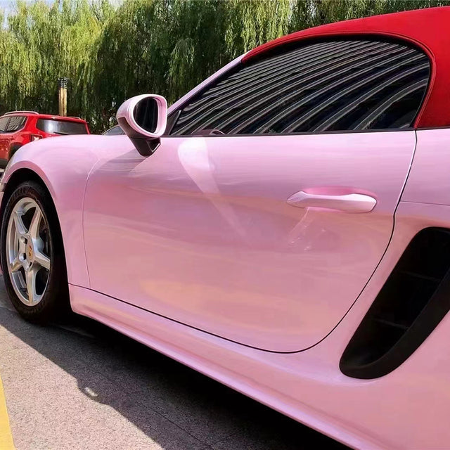 close up shot of a car wrapped in gloss malus spectabilis car wrap