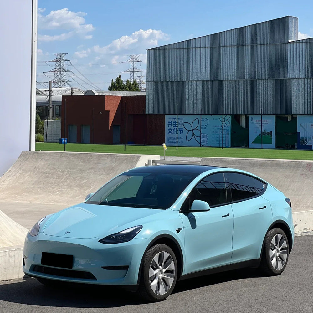 gloss mesisen blue car wrap on a car