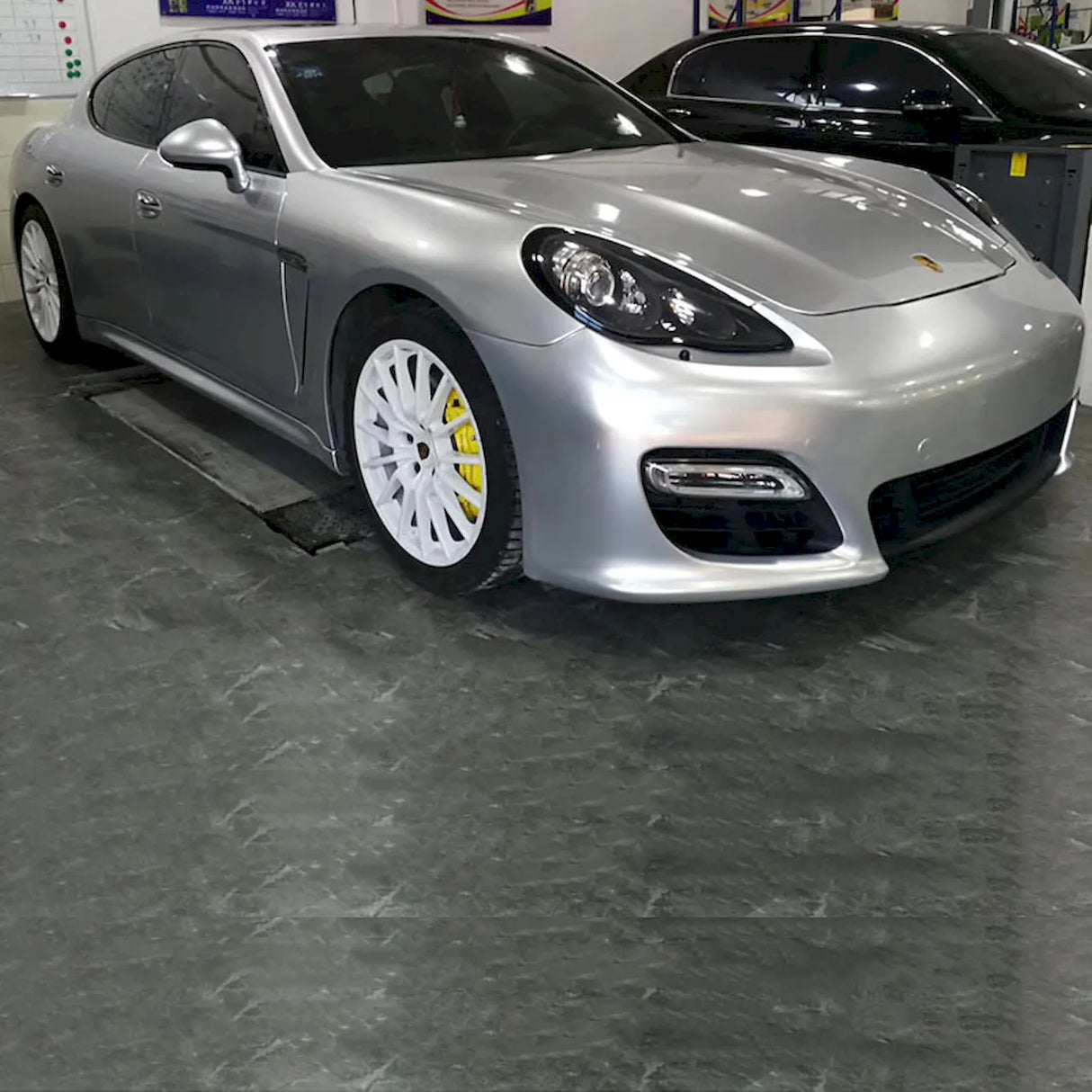 gloss silver car wrap installed on a hatchback