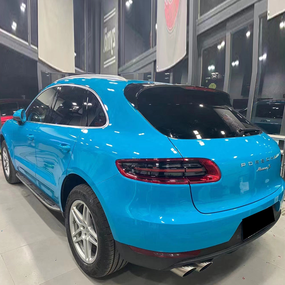 suv wrapped in gloss miami blue car wrap