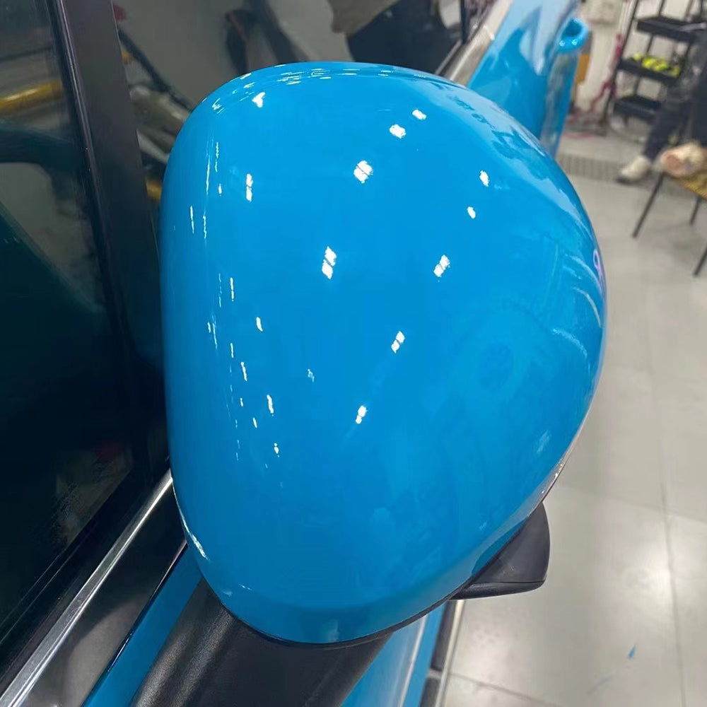 gloss miami blue car wrap on a mirror