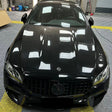 car wrapped with gloss piano black car wrap