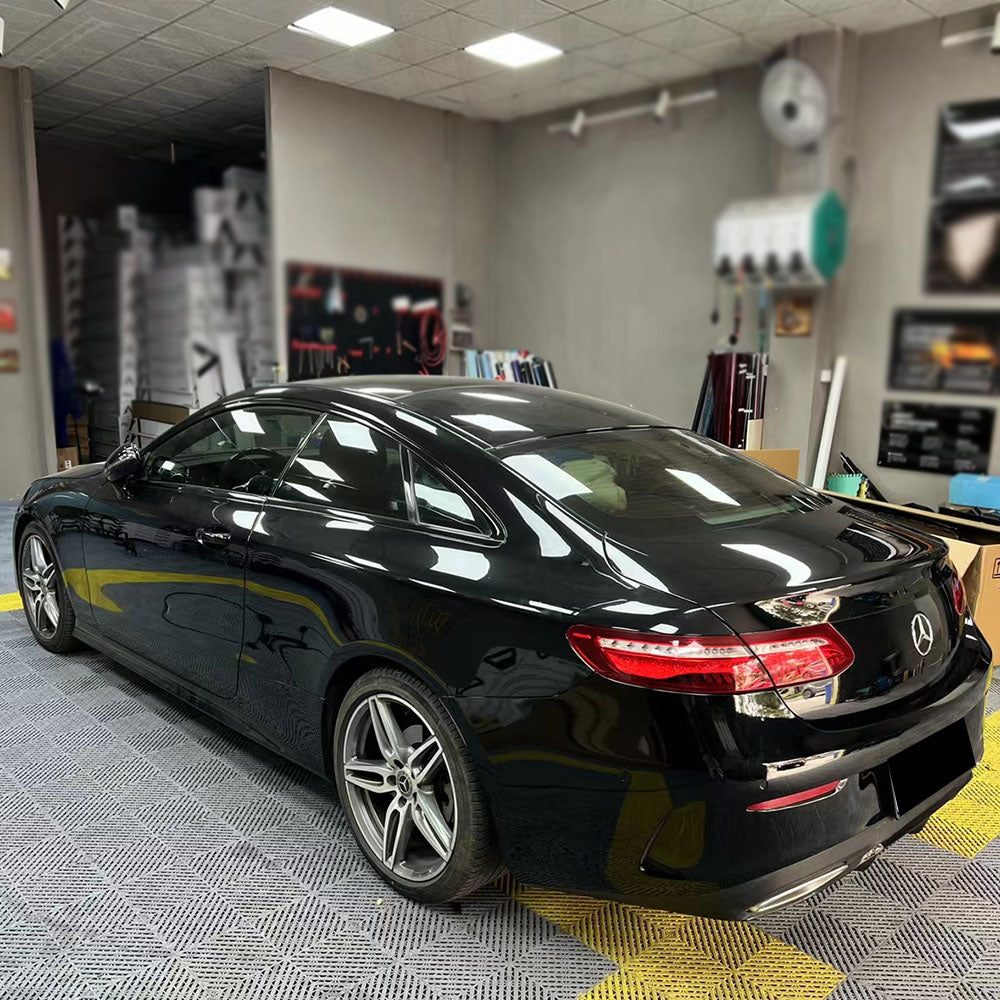 car wrapped in gloss piano black car wrap