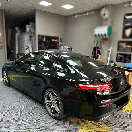 car wrapped in gloss piano black car wrap