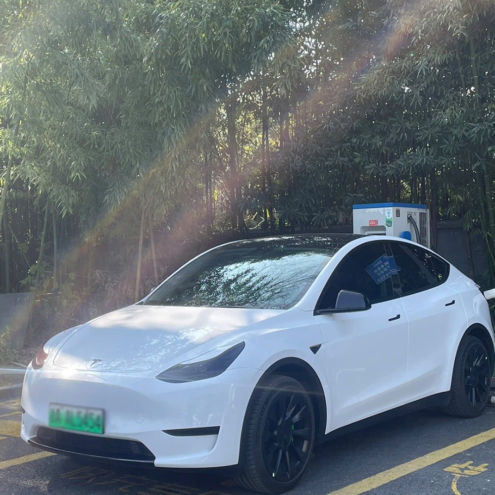 gloss piano white car wrap on a tesla