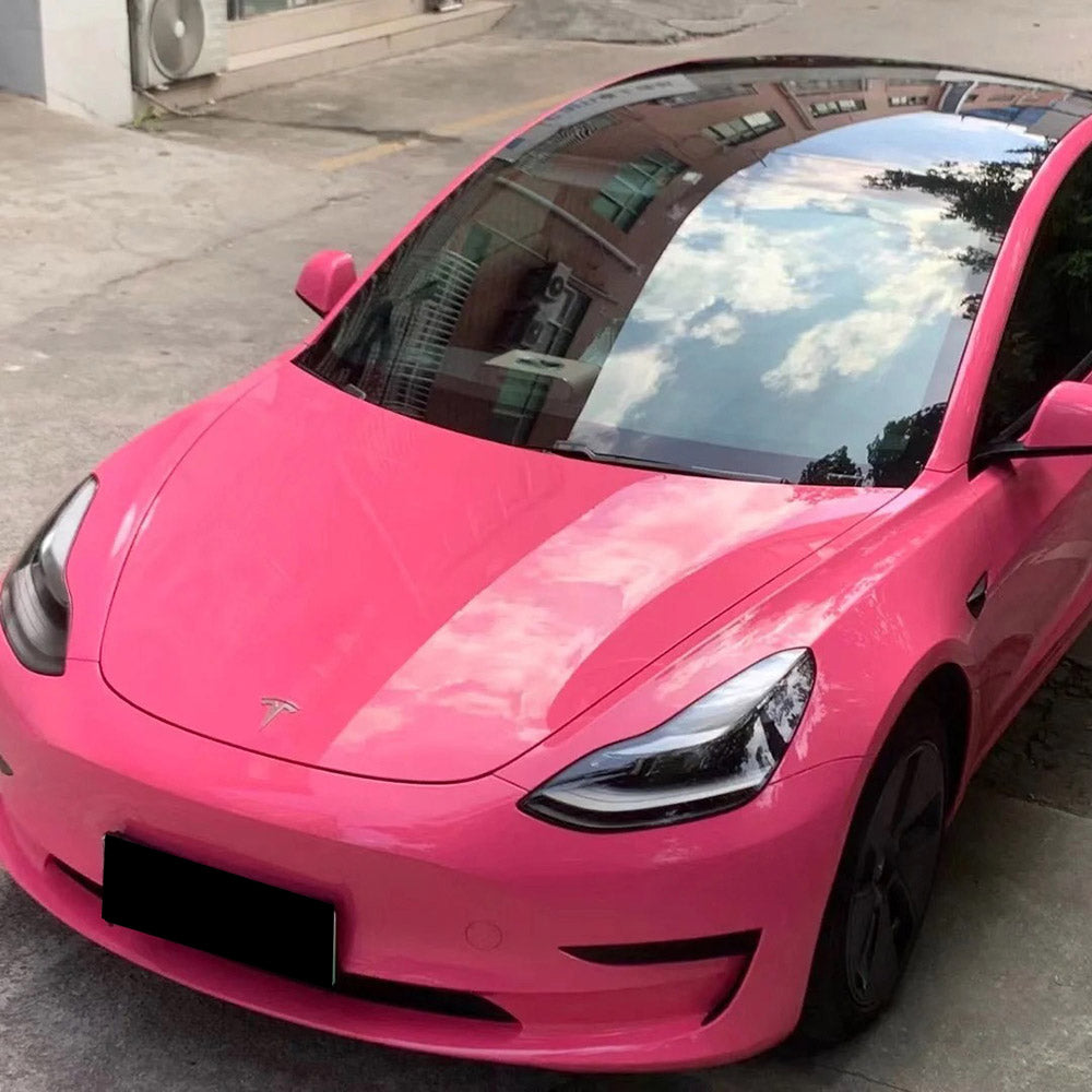 gloss princess pink car wrap installed on a vehicle