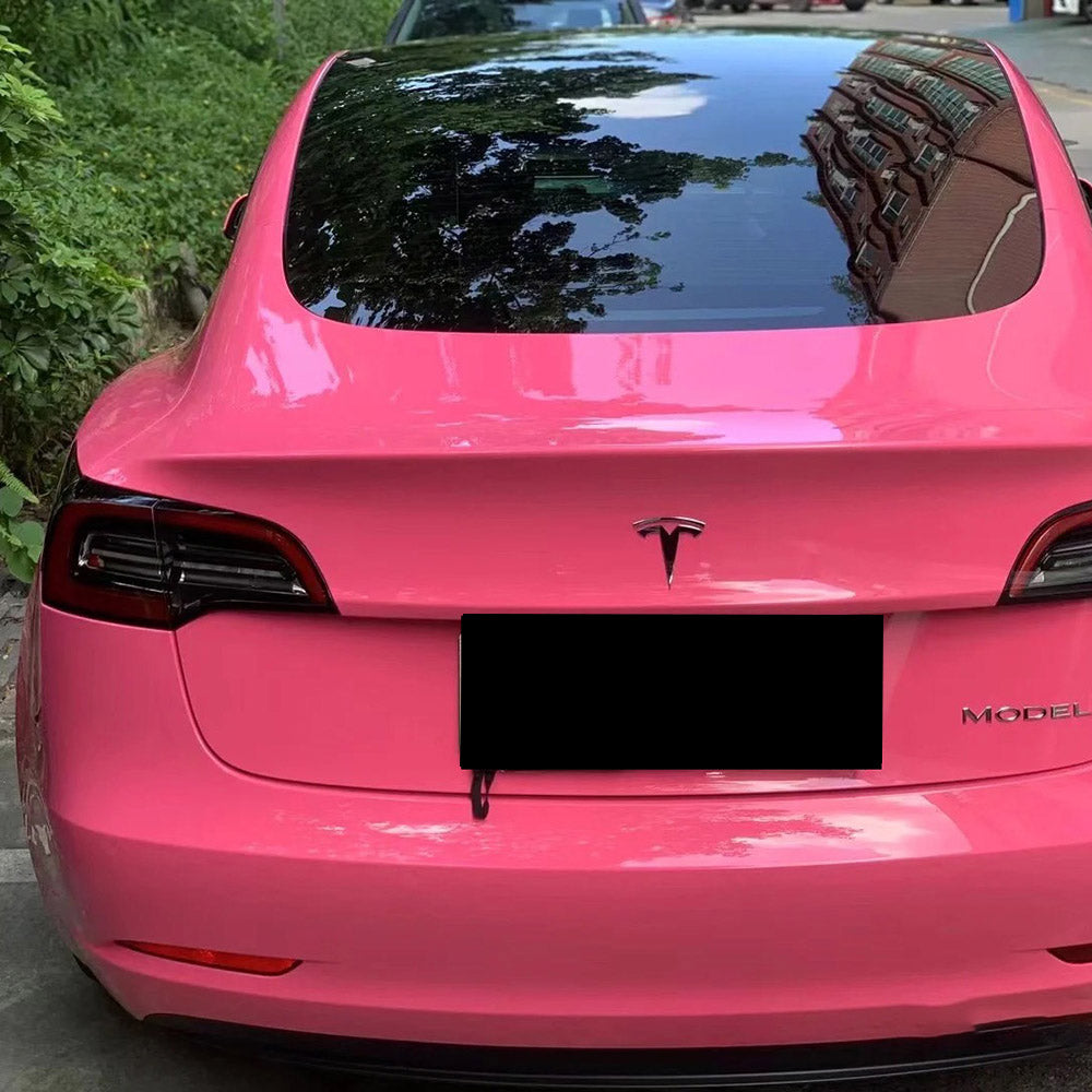 gloss princess pink car wrap on a car