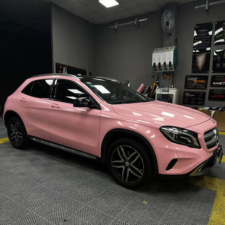 car wrapped in gloss rouge pink car wrap