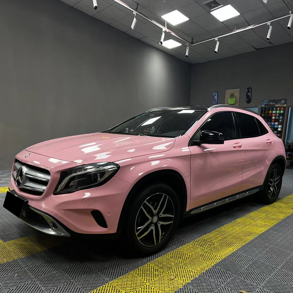 vehicle wrapped in gloss rouge pink vinyl wrap
