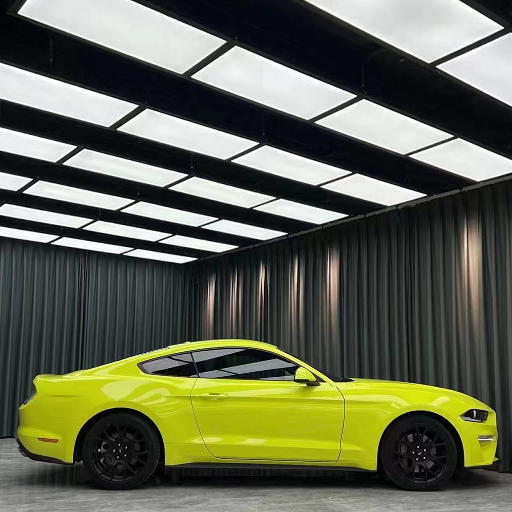 side profile of a car wrapped in gloss st paulo yellow car wrap