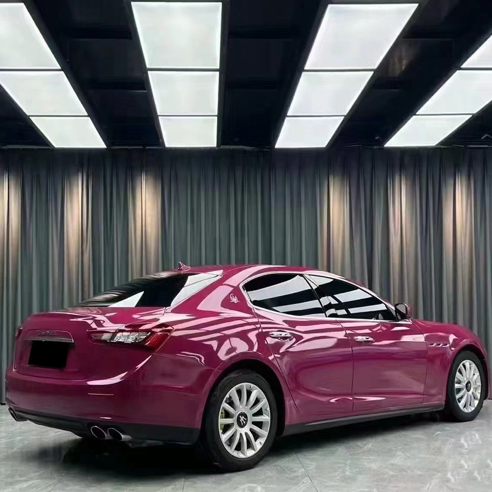 gloss stalight ruby red car wrap under indoor lighting