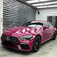 gloss stalight ruby red car wrap on a car