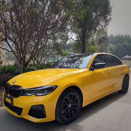 car wrapped in gloss sunflower yellow car wrap