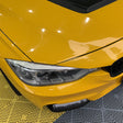 up close look at gloss sunflower yellow car wrap