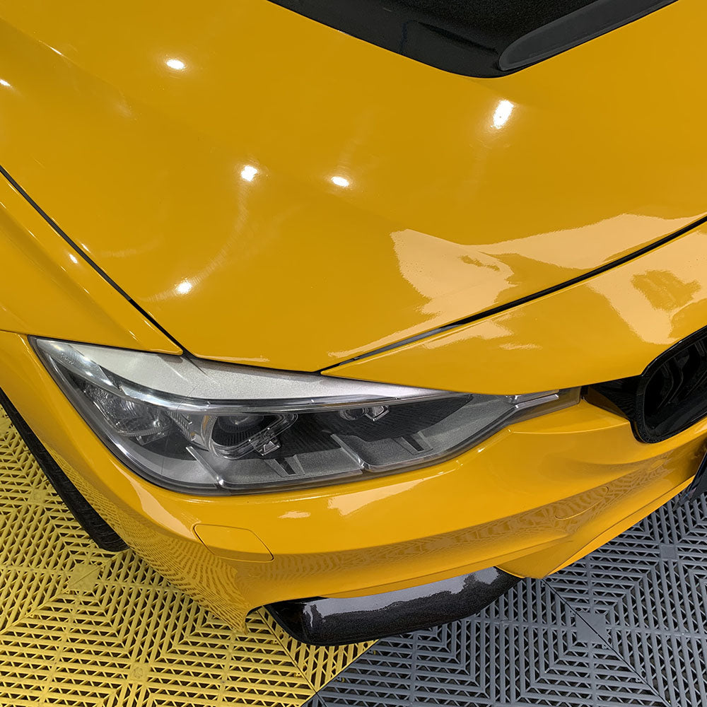 up close look at gloss sunflower yellow car wrap