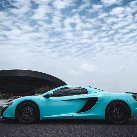 gloss tiffany blue car wrap on a supercar