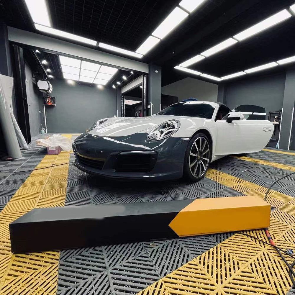 gloss volcano grey car wrap being installed