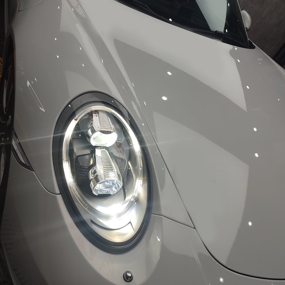 sports car wrapped in gloss volcano grey car wrap