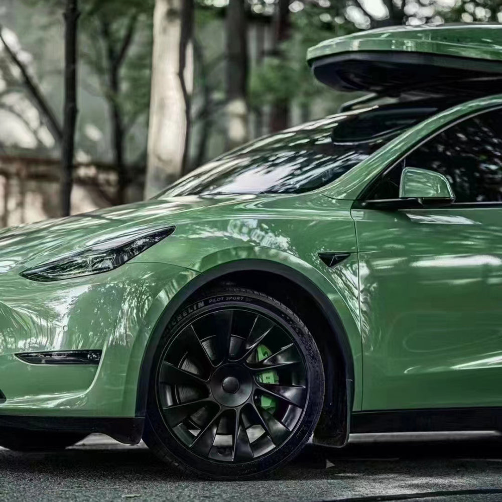 gloss weng green car wrap installed on a car