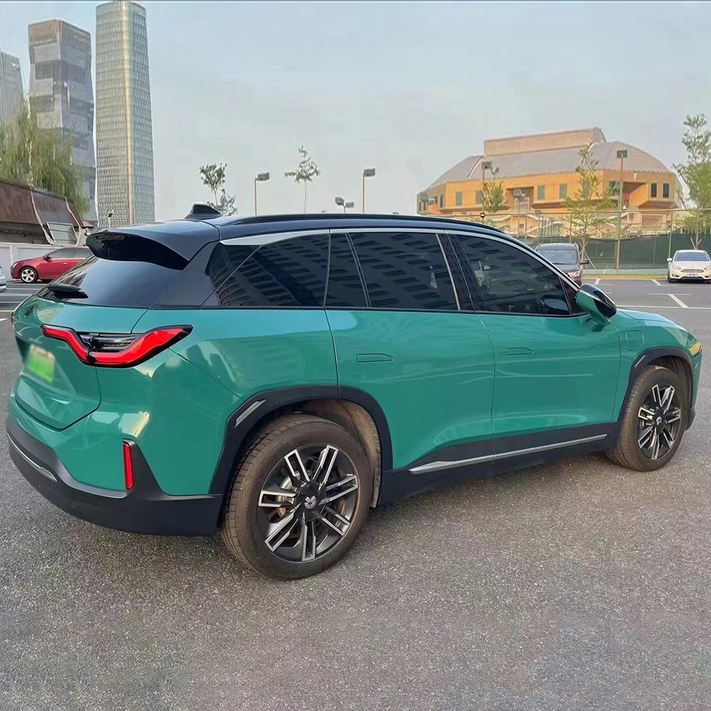 car wrapped in gloss windstorm green car wrap
