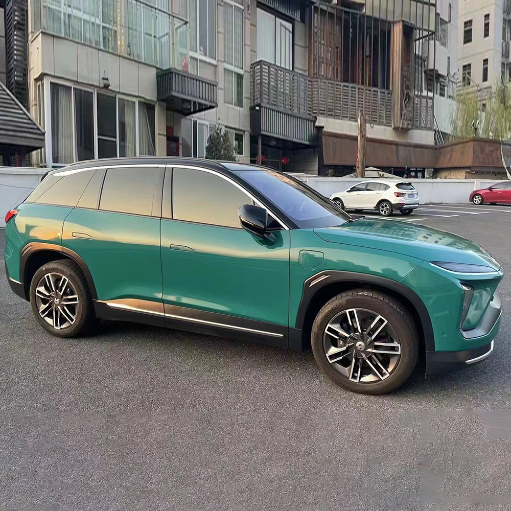 gloss windstorm green car wrap on a SUV