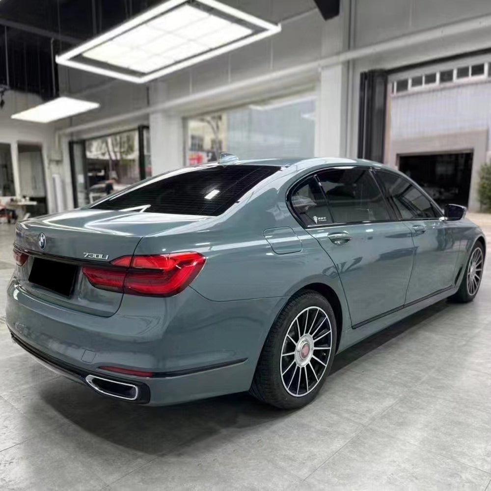 gloss yugali cyan blueish gray car wrap installed on a sedan