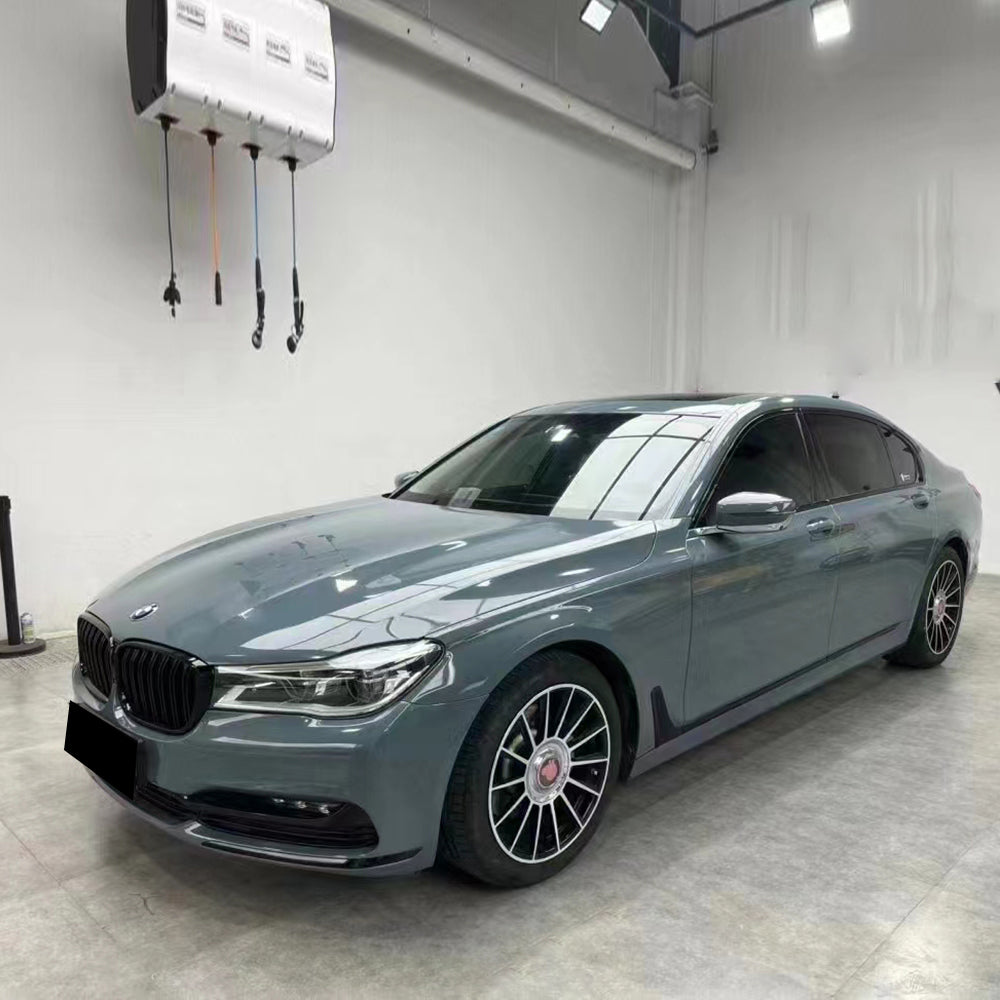 gloss yugali cyan blueish gray car wrap being installed