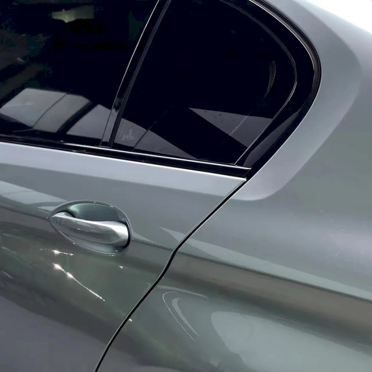 up close shot of highland metallic silver green car wrap