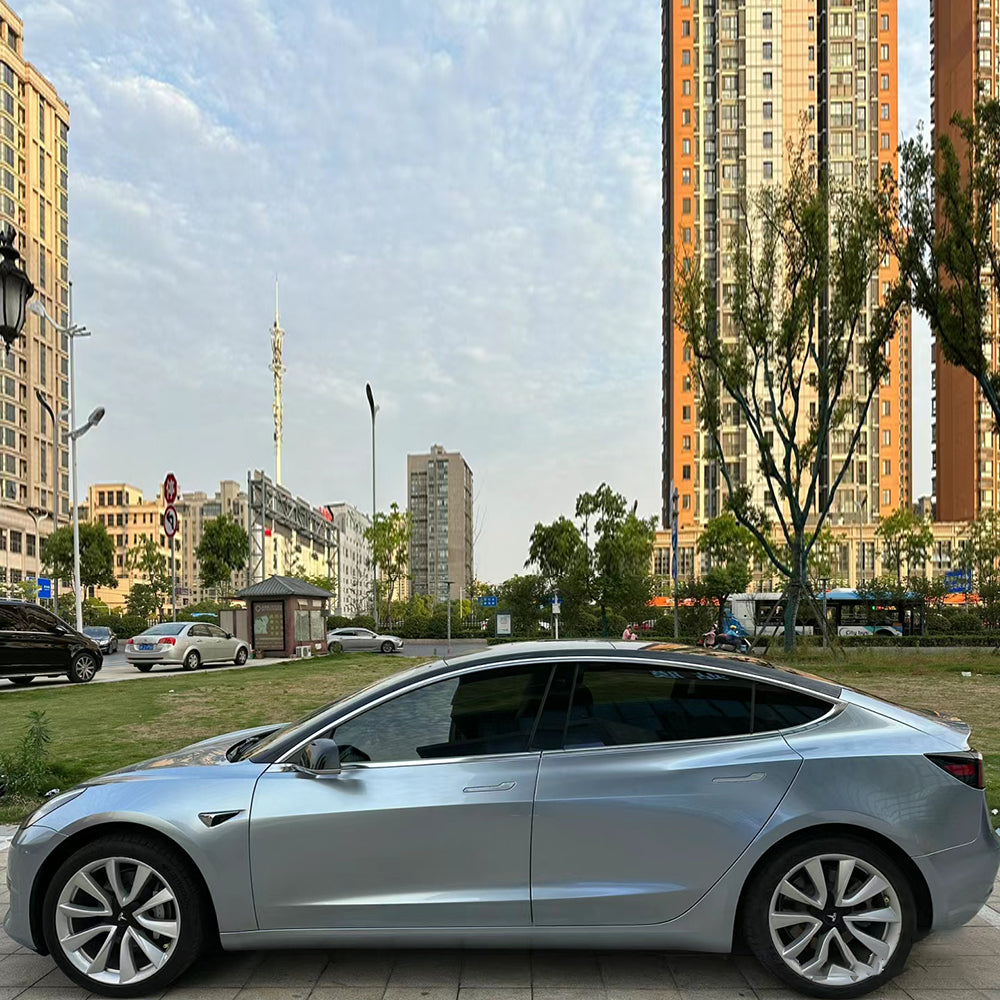 car wrapped in a liquid grey silver car wrap