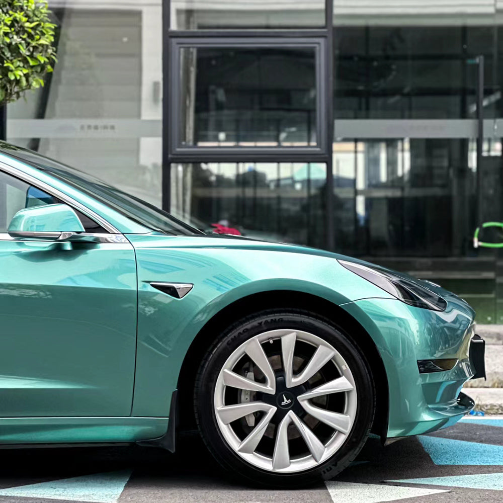 up close liquid peacock green car wrap