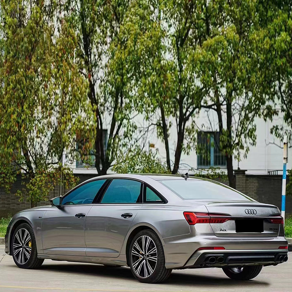 sedan wrapped in liquid silver car wrap