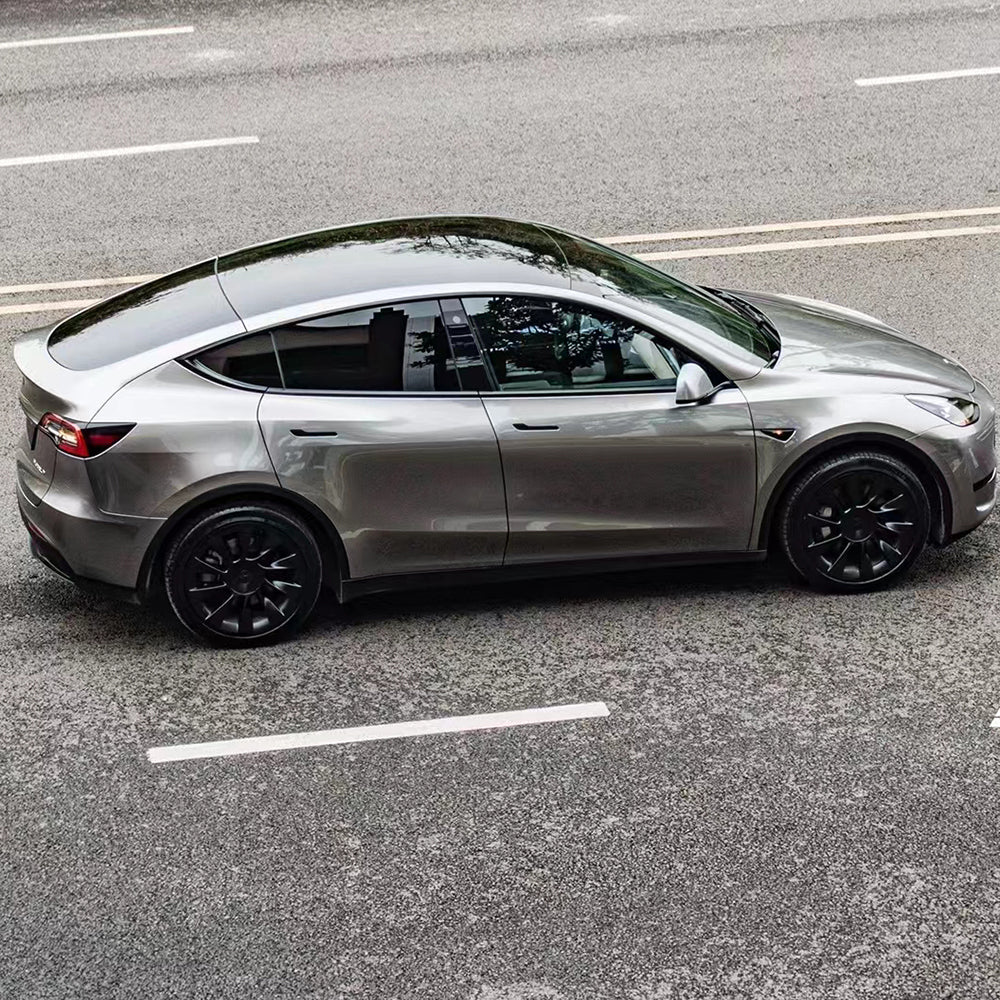 car wrapped in liquid silver car wrap