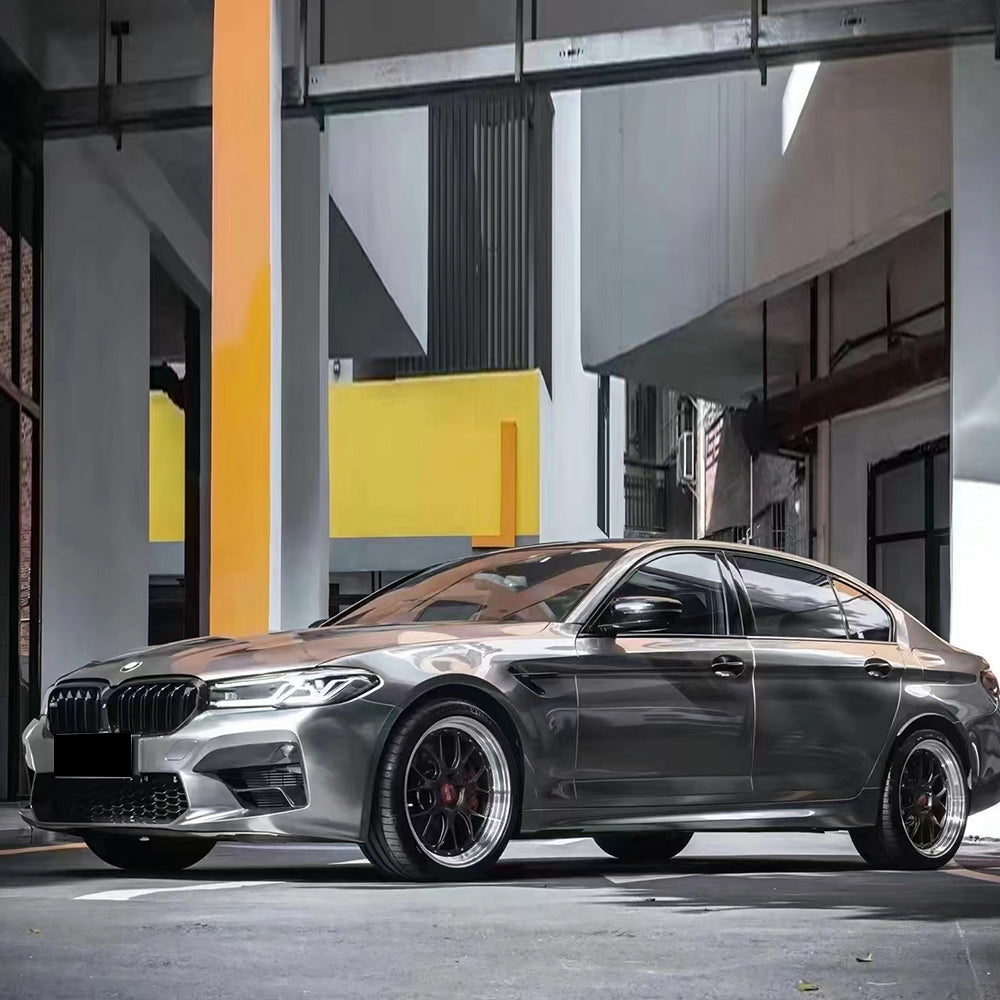 liquid silver car wrap installed on a bmw m5