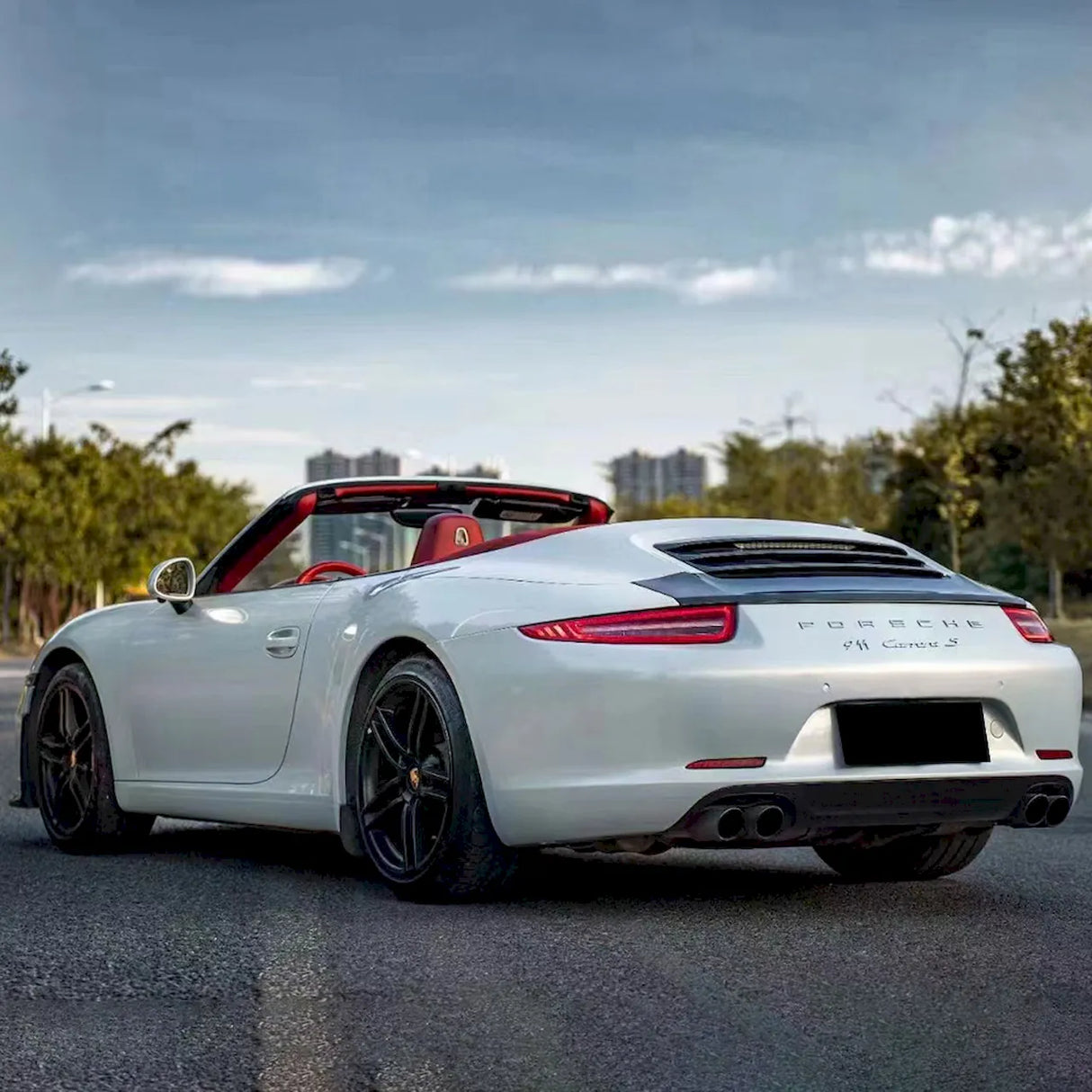 porsche wrapped in a martin silver gray car wrap
