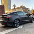 matte black car wrap on a tesla