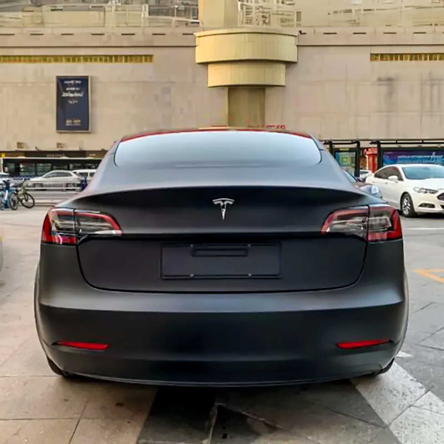 matte black car wrap on a tesla