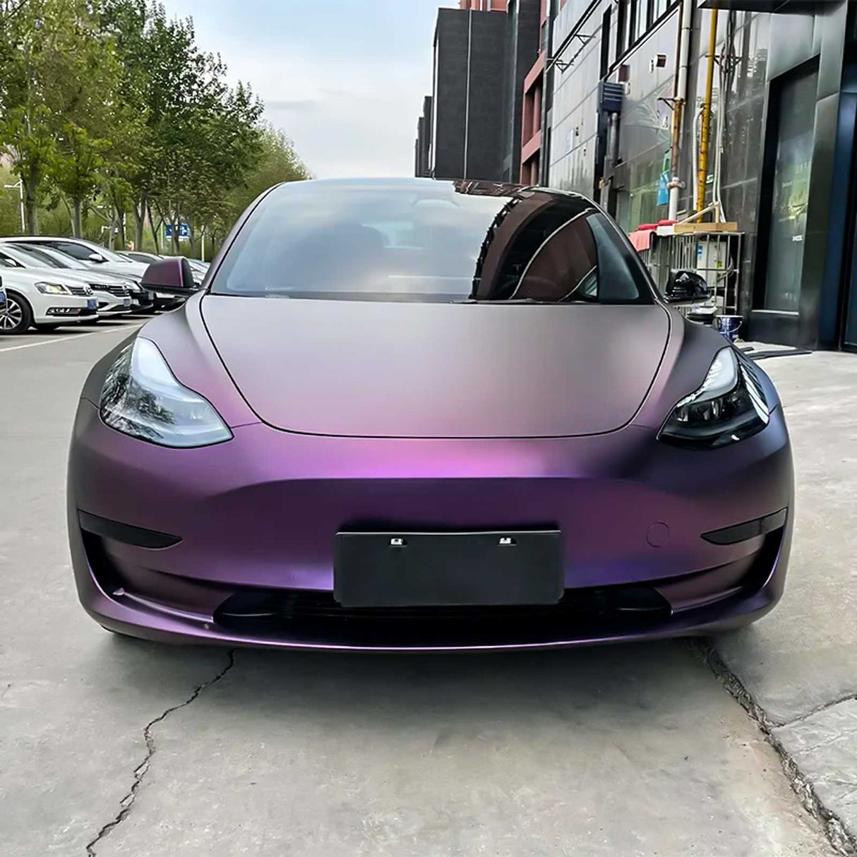 front shot of a car wrapped in matte purple car wrap