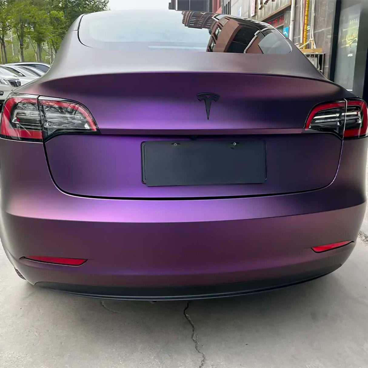 matte purple car wrap on a tesla model 3