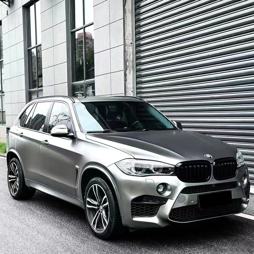 bmw x5m wrapped in matte liquid silver car wrap