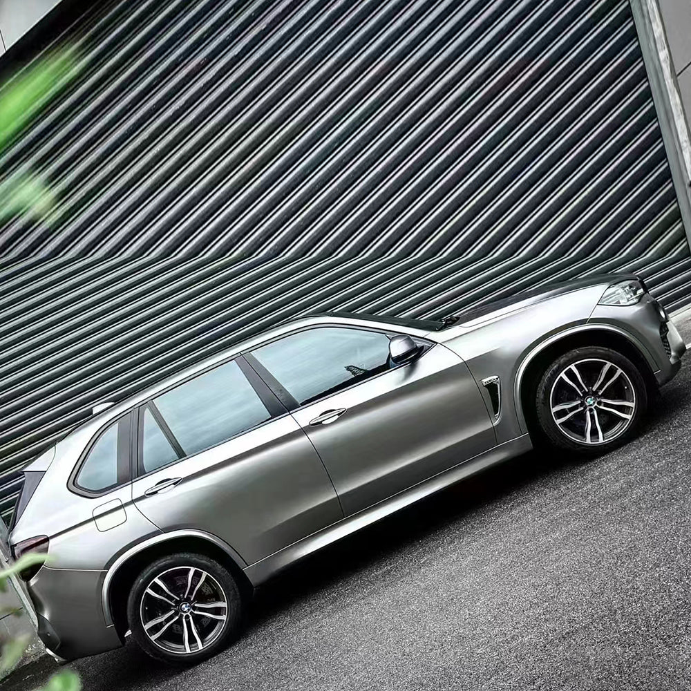 suv wrapped in matte liquid silver car wrap